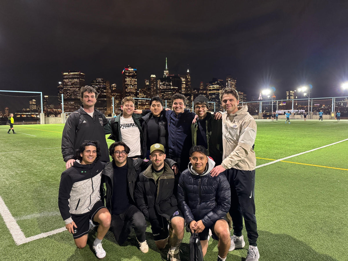 Figurati players after a night pickup game, Manhattan skyline behind