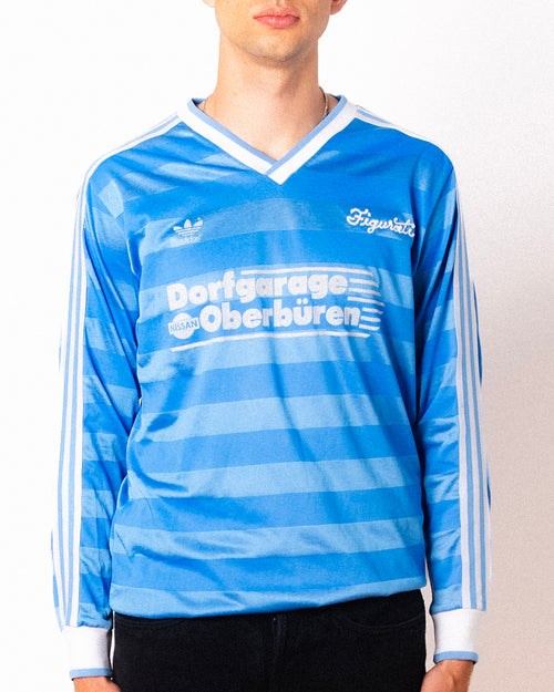 Vintage Adidas light blue striped long sleeve football shirt with Dorfgarage Oberburen sponsor and Figurati embroidery, front