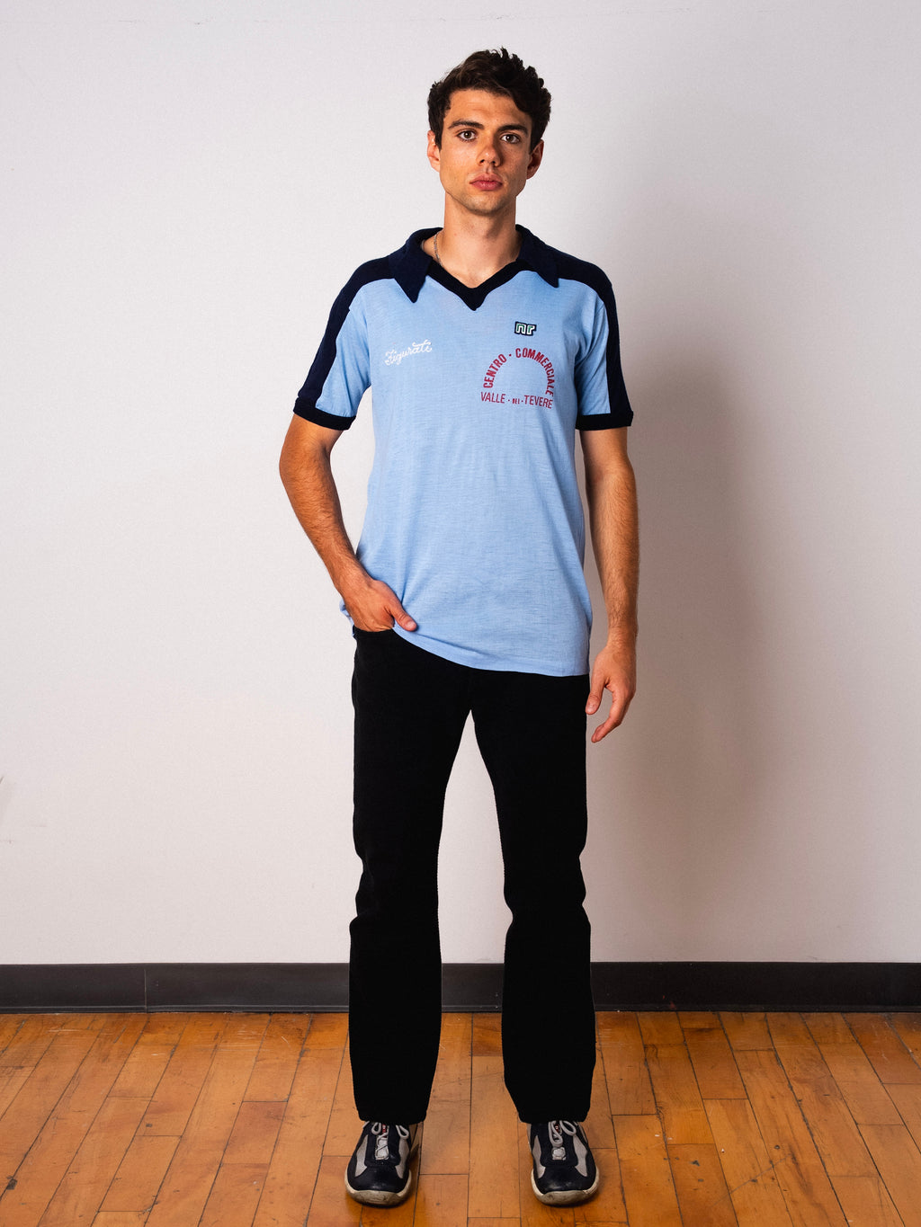 Vintage Ennerre light blue short sleeve football shirt with Centro Commerciale Valle del Tevere sponsor and Figurati embroidery, full body front