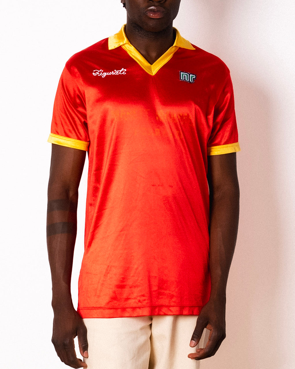 Vintage Ennerre red satin short sleeve football shirt with yellow collar and Figurati embroidery, front