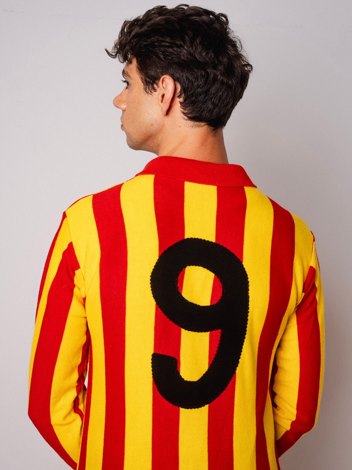 Vintage Ennerre red and yellow striped long sleeve football shirt with Figurati embroidery, back
