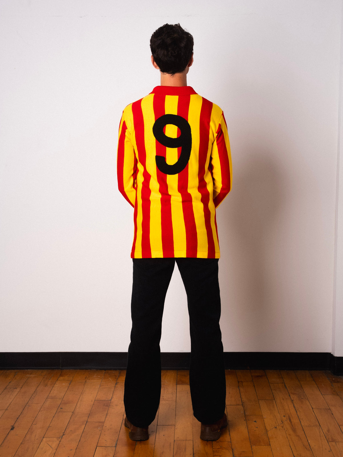 Vintage Ennerre red and yellow striped long sleeve football shirt with Figurati embroidery, full body back