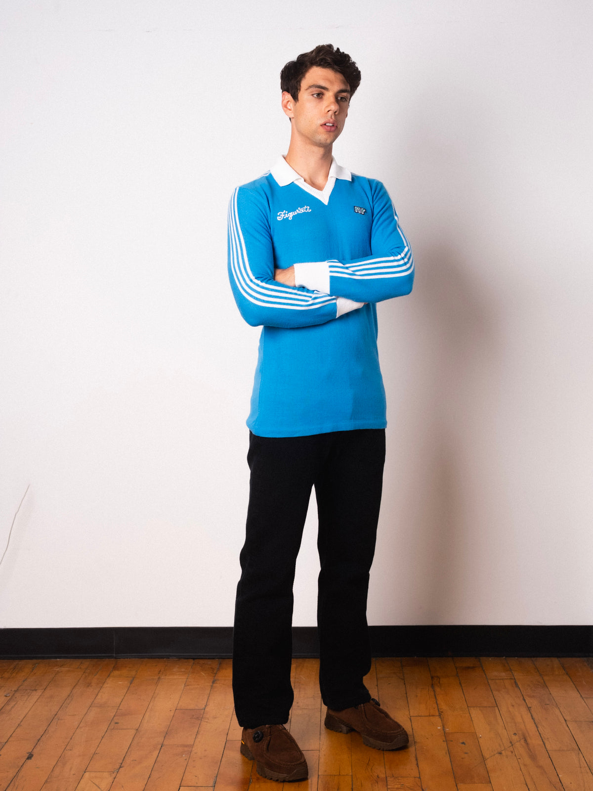 Vintage Ennerre sky blue long sleeve football shirt with Figurati embroidery, full body front