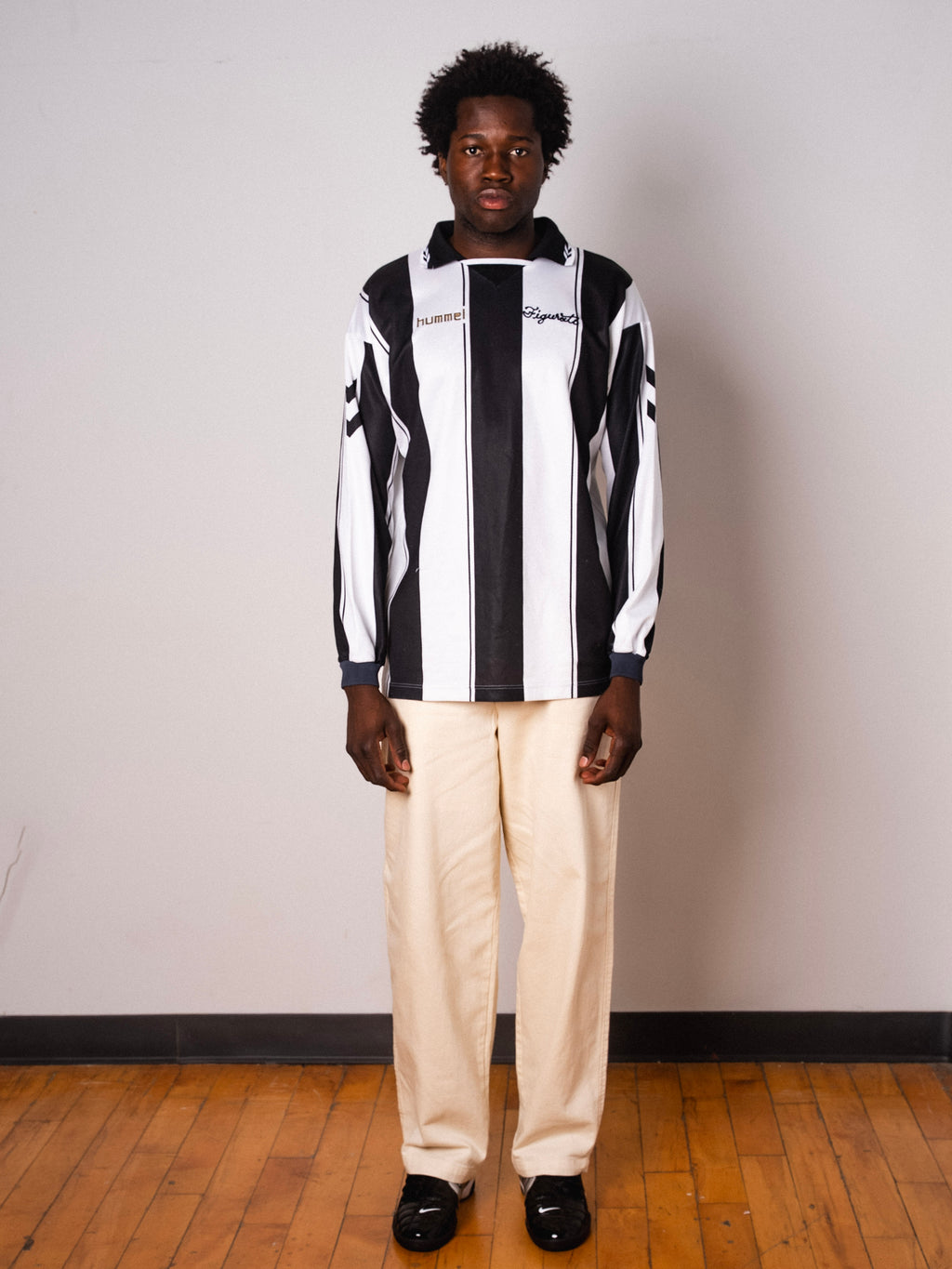 Vintage Hummel black and white striped long sleeve football shirt with Figurati embroidery, full body front