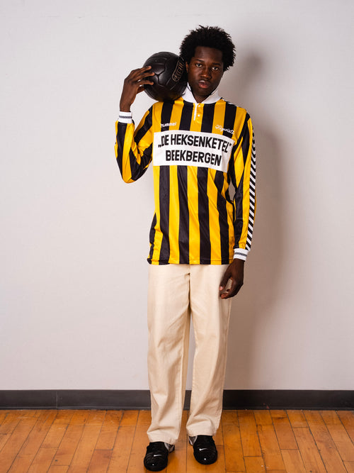 Vintage Hummel yellow and black striped long sleeve football shirt with De Heksenketel Beekbergen sponsor and Figurati embroidery, full body front