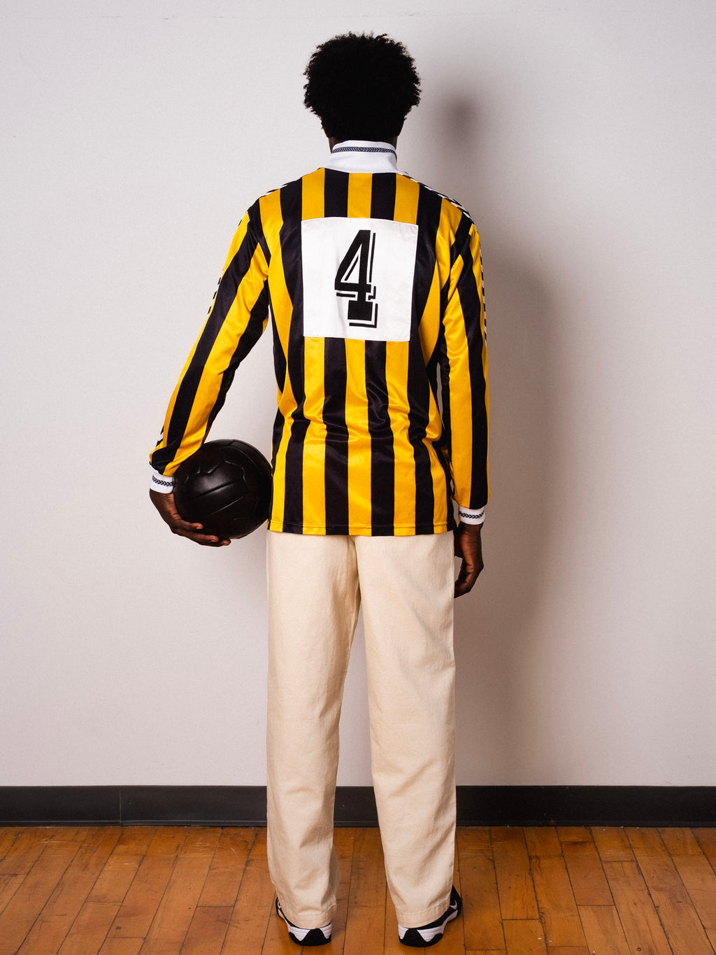 Vintage Hummel yellow and black striped long sleeve football shirt with De Heksenketel Beekbergen sponsor and Figurati embroidery, full body back