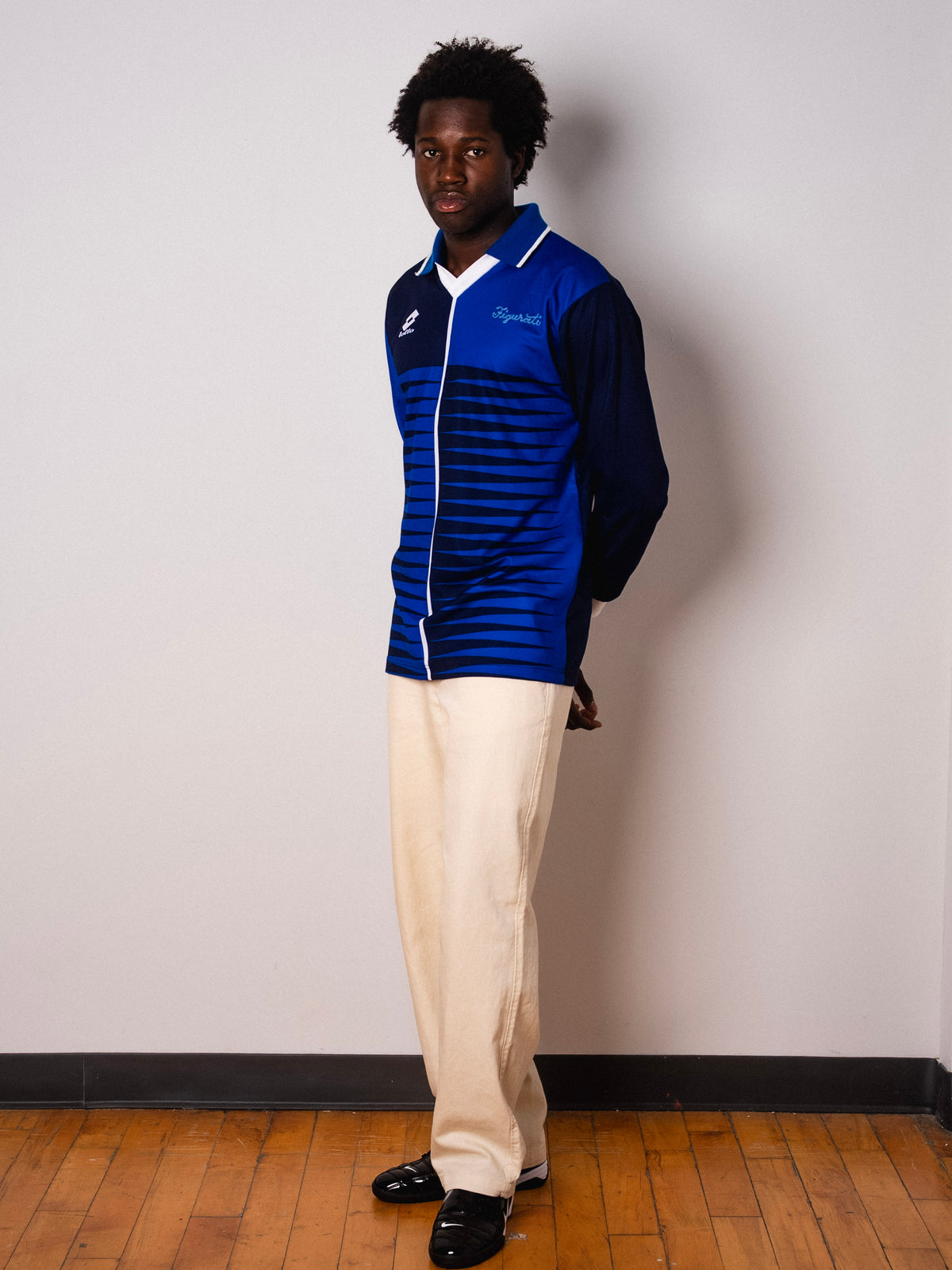 Vintage Lotto navy and blue long sleeve football shirt with Figurati embroidery, full body front
