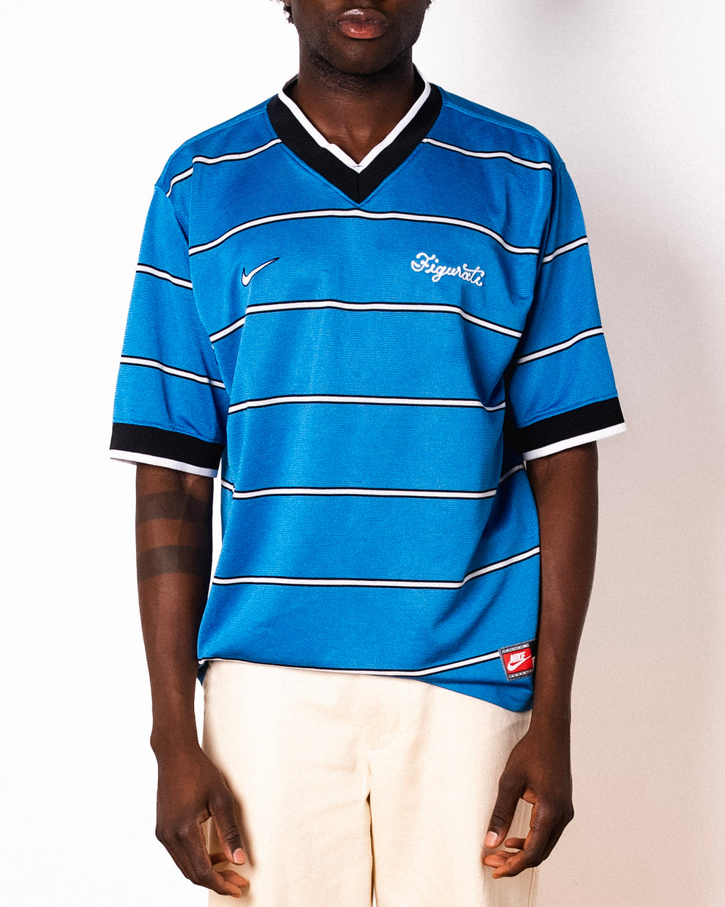 Vintage Nike blue striped short sleeve football shirt with Figurati embroidery, front