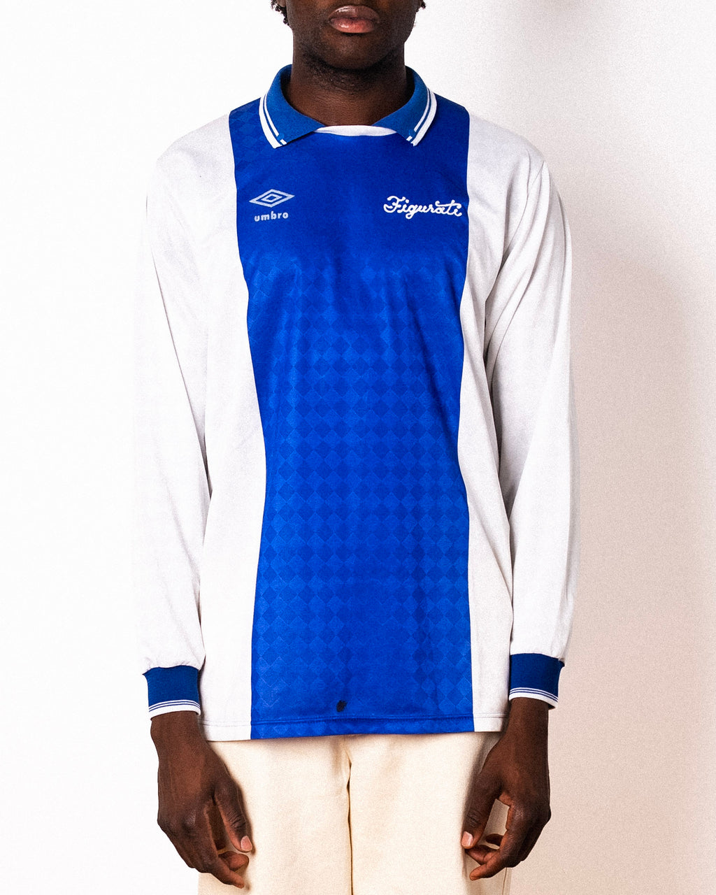 Vintage Umbro blue and white long sleeve football shirt with Figurati embroidery, front