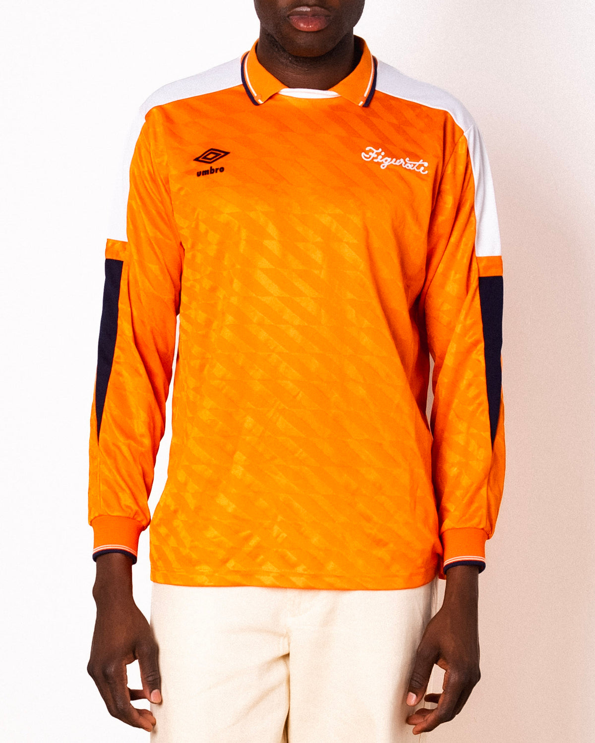 Vintage Umbro orange long sleeve football shirt with Figurati embroidery, front
