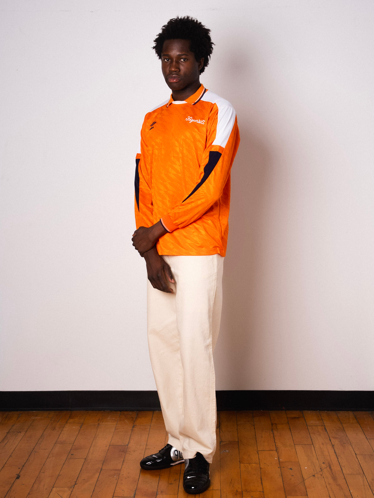 Vintage Umbro orange long sleeve football shirt with Figurati embroidery, full body front