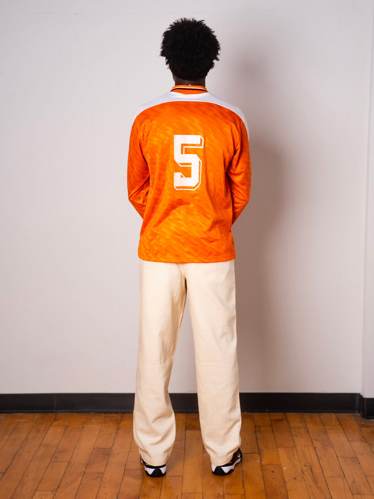 Vintage Umbro orange long sleeve football shirt with Figurati embroidery, full body back with number 5