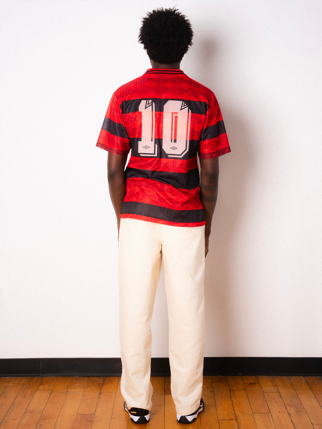 Vintage Umbro red and black striped short sleeve football shirt with Figurati embroidery, full body back
