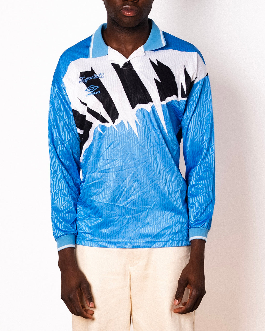 Vintage Umbro sky blue abstract print long sleeve football shirt with Figurati embroidery, front