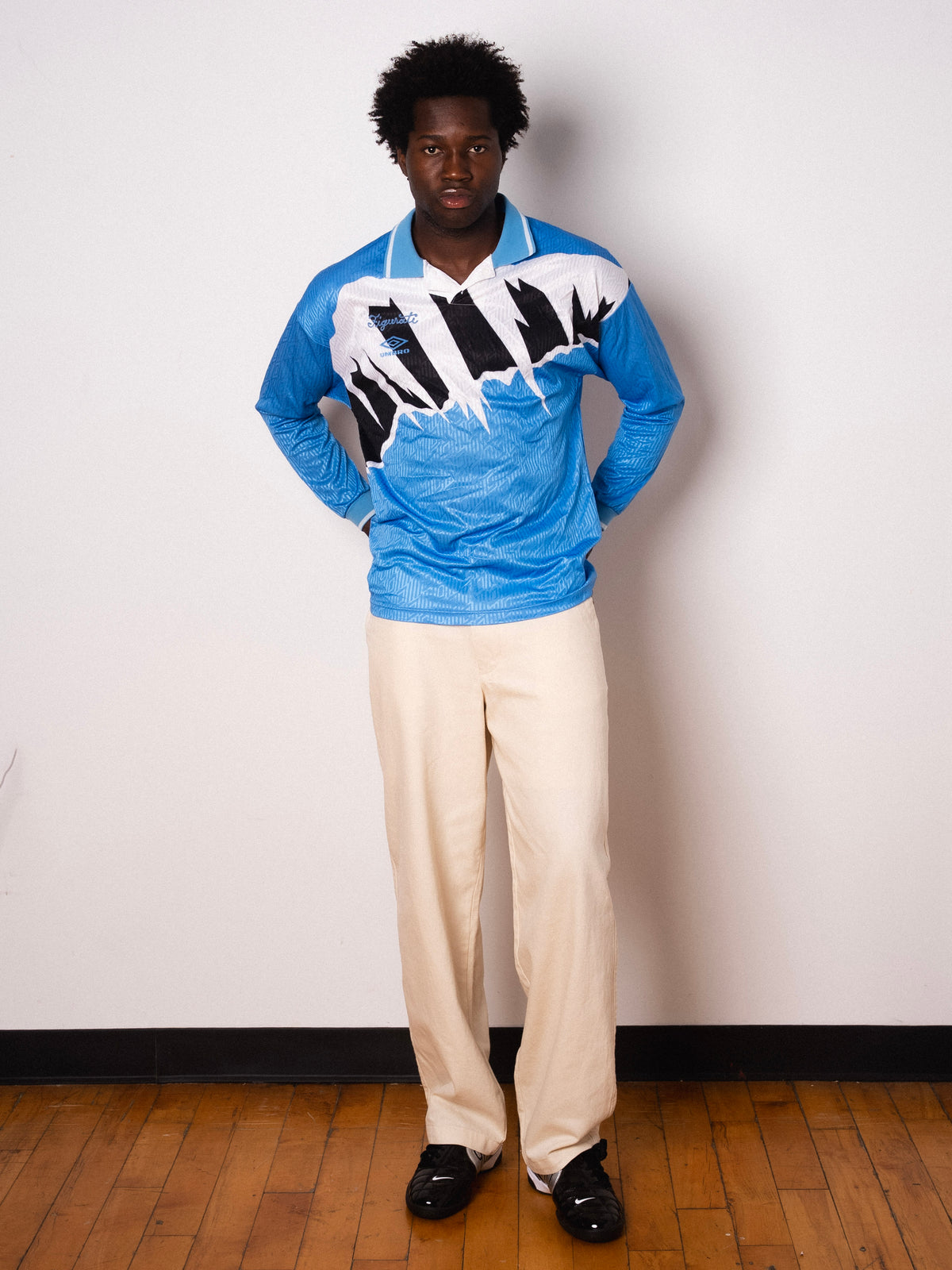Vintage Umbro sky blue abstract print long sleeve football shirt with Figurati embroidery, full body front